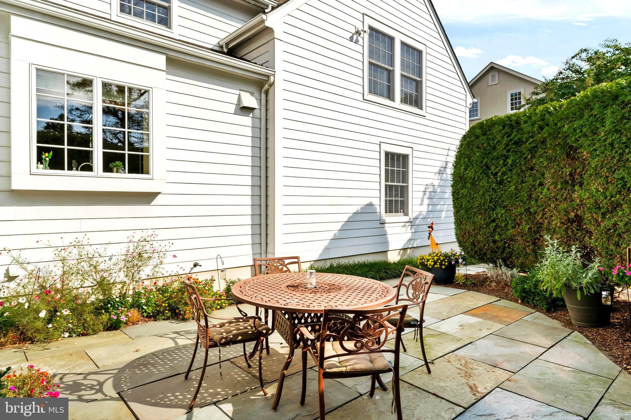 809 Matlack Drive Moorestown, NJ 08057 - Photo 60 of 67 a view of a patio with table and chairs and potted plants