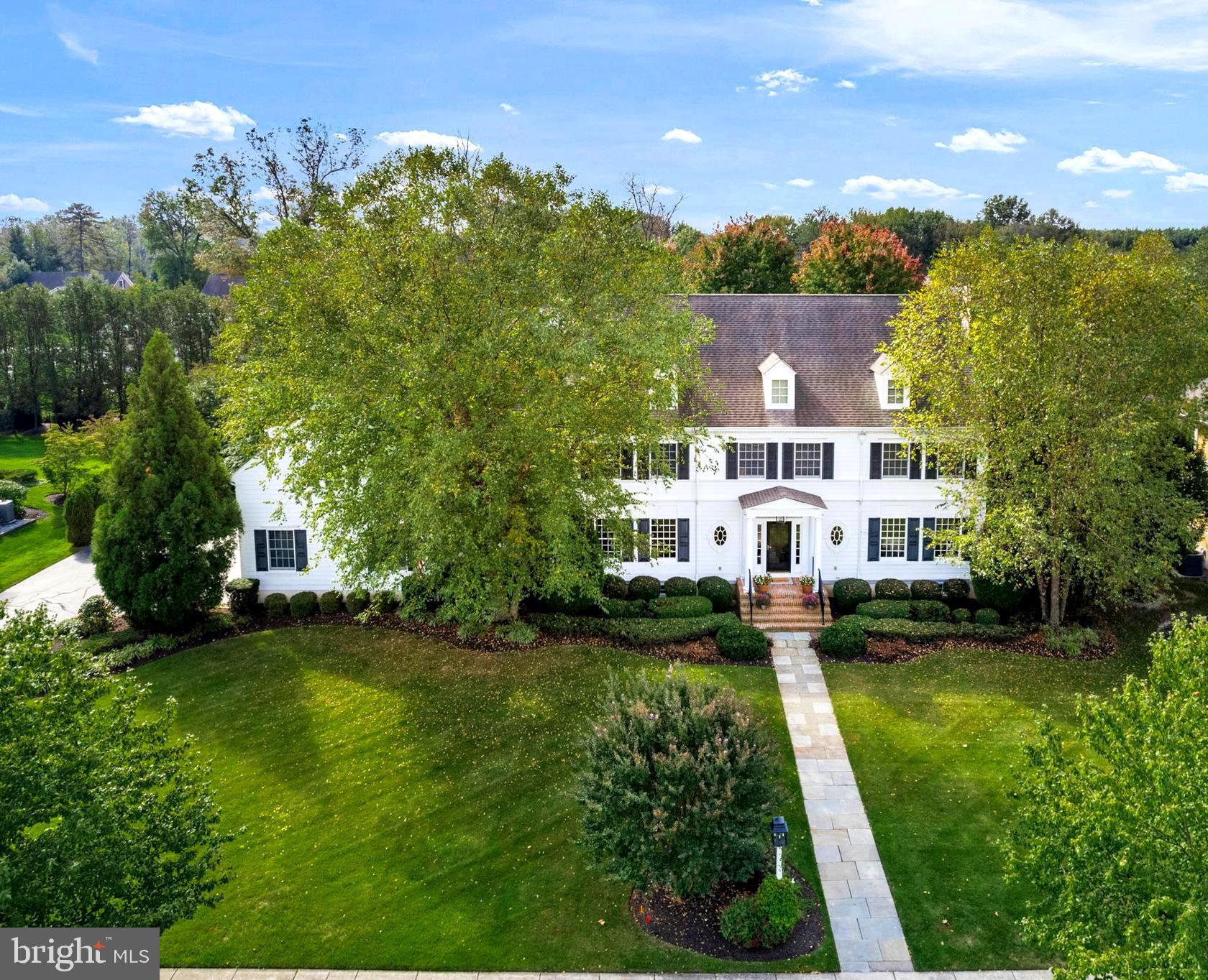 809 Matlack Drive Moorestown, NJ 08057 - Photo 64 of 67 a view of a white house with a big yard plants and large trees