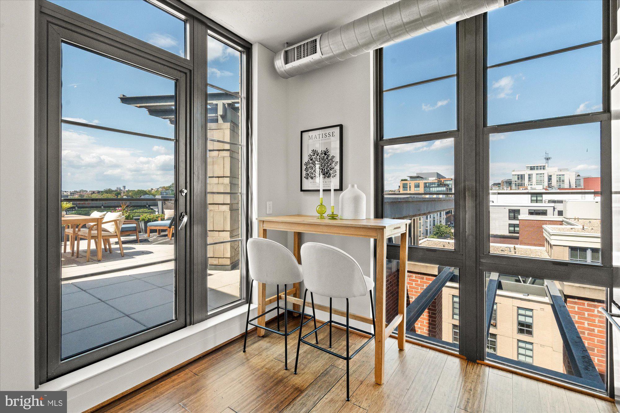 2125 14th Street Northwest, Unit 915 Washington, DC 20009 - Photo 13 of 28 Corner dining space leading to main level terrace