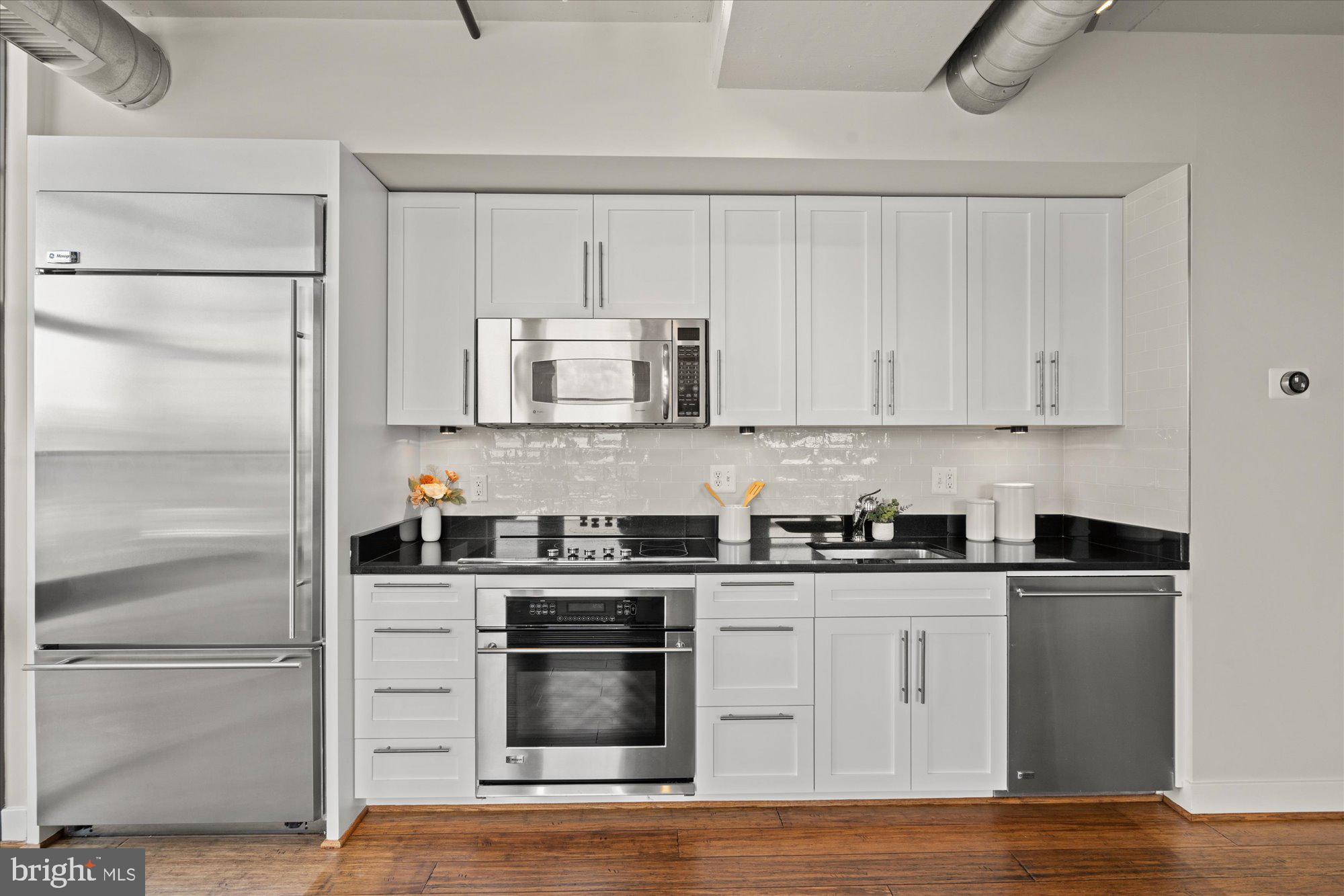 2125 14th Street Northwest, Unit 915 Washington, DC 20009 - Photo 9 of 28 Recently updated kitchen with stainless appliances