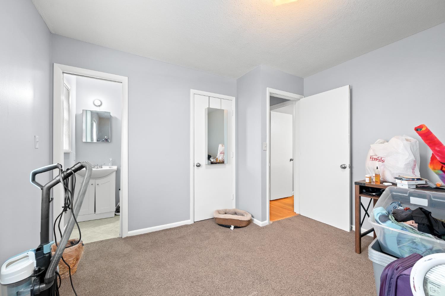 969 Hawkins Road Evington, VA 24550 - Photo 19 of 40 Primary Bedroom at the end of the hall. Ensuite 1/2 bath