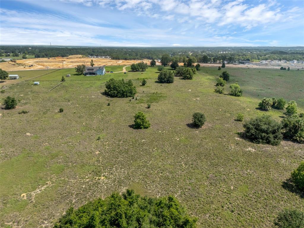 Starcrest Lane Clermont, FL 34715 - Photo 3 of 22 a view of a lake with a city