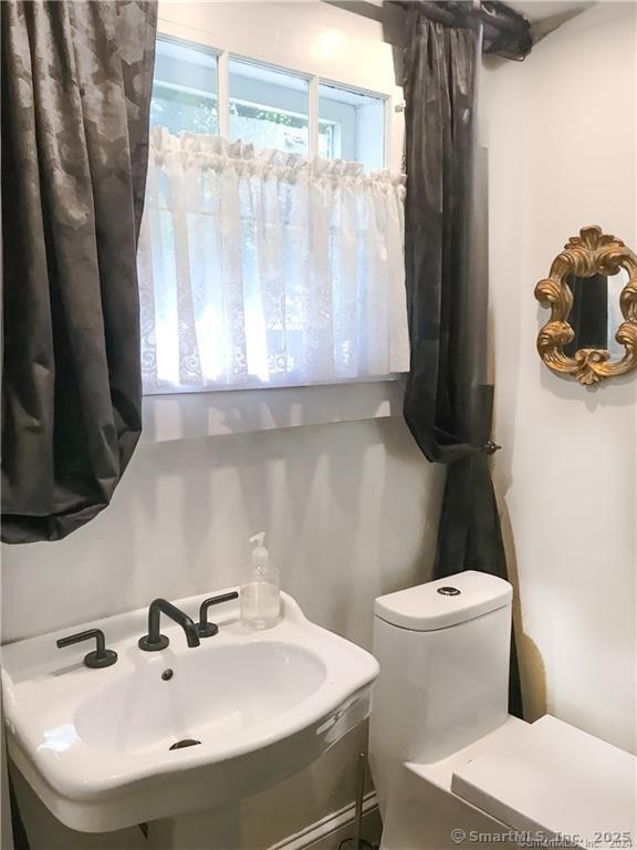 47 Johnson Road Kent, CT 06757 - Photo 13 of 40 a bathroom with a sink toilet and a mirror