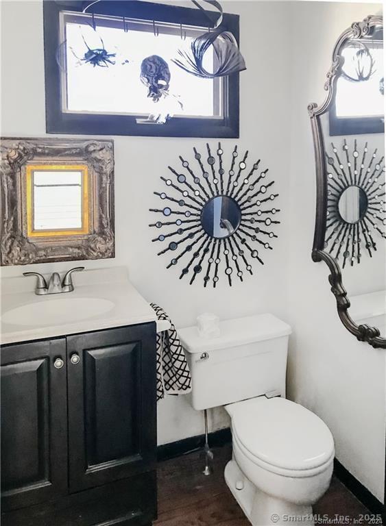 47 Johnson Road Kent, CT 06757 - Photo 15 of 40 a bathroom with a toilet a sink and mirror