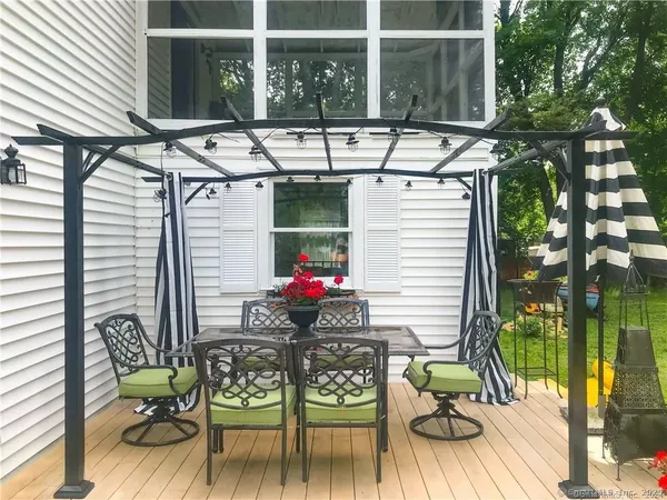a table and chairs in a patio