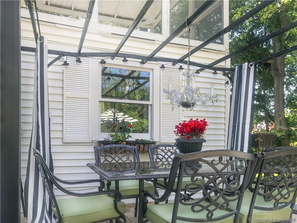 47 Johnson Road Kent, CT 06757 - Photo 24 of 40 a table and chairs in a patio