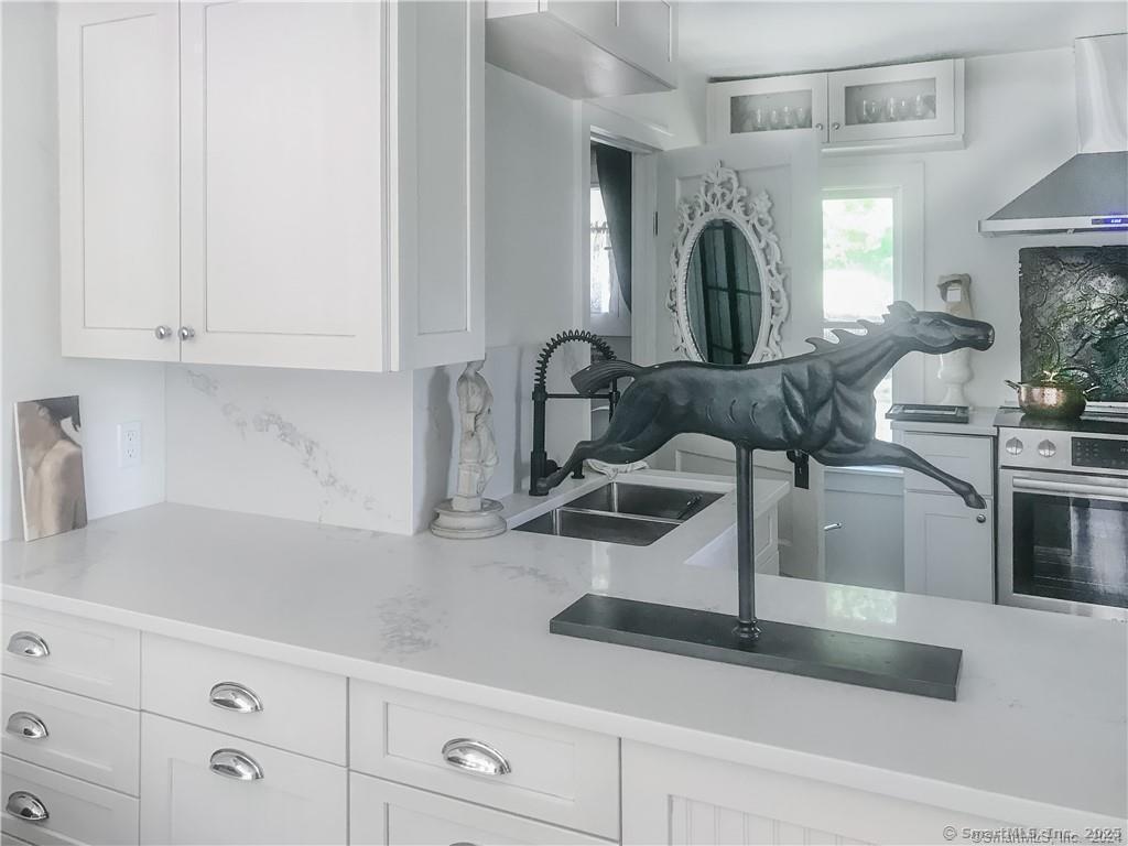 47 Johnson Road Kent, CT 06757 - Photo 3 of 40 a kitchen with a sink cabinets and appliances