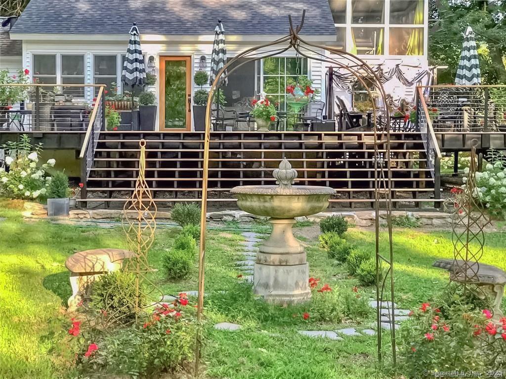 47 Johnson Road Kent, CT 06757 - Photo 34 of 40 a view of a garden with a flower garden