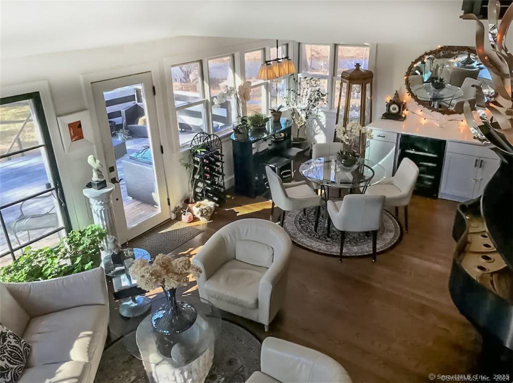 47 Johnson Road Kent, CT 06757 - Photo 8 of 40 a living room with furniture and a floor to ceiling window