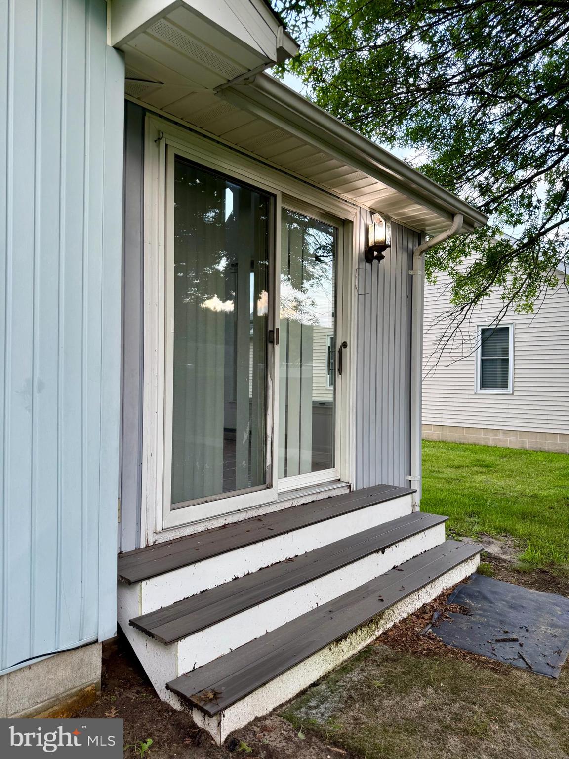 22 Windmill Lane Ocean View, DE 19970 - Photo 26 of 37 a front view of a house with a garden