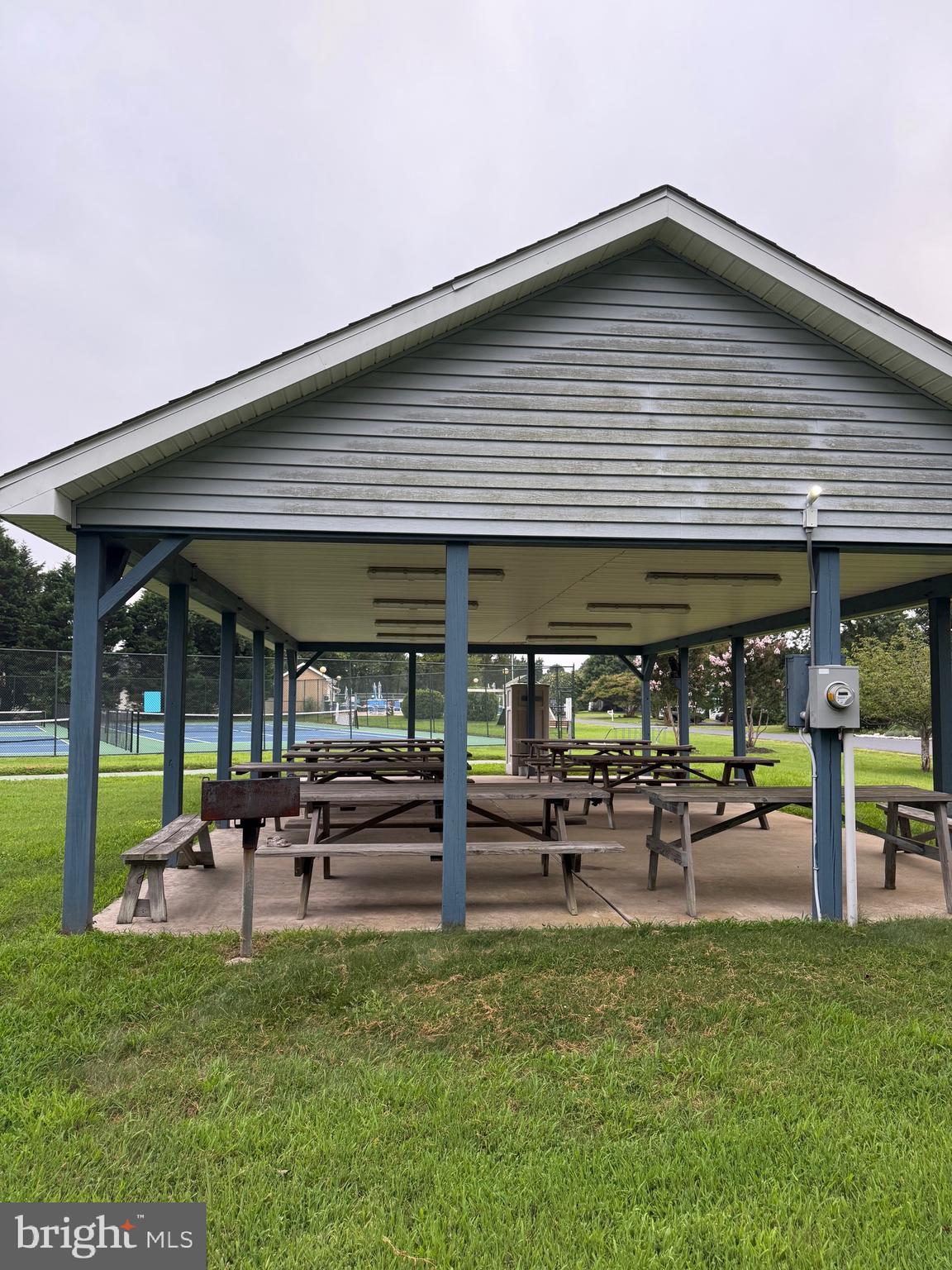 22 Windmill Lane Ocean View, DE 19970 - Photo 32 of 37 a front view of a house with a garden