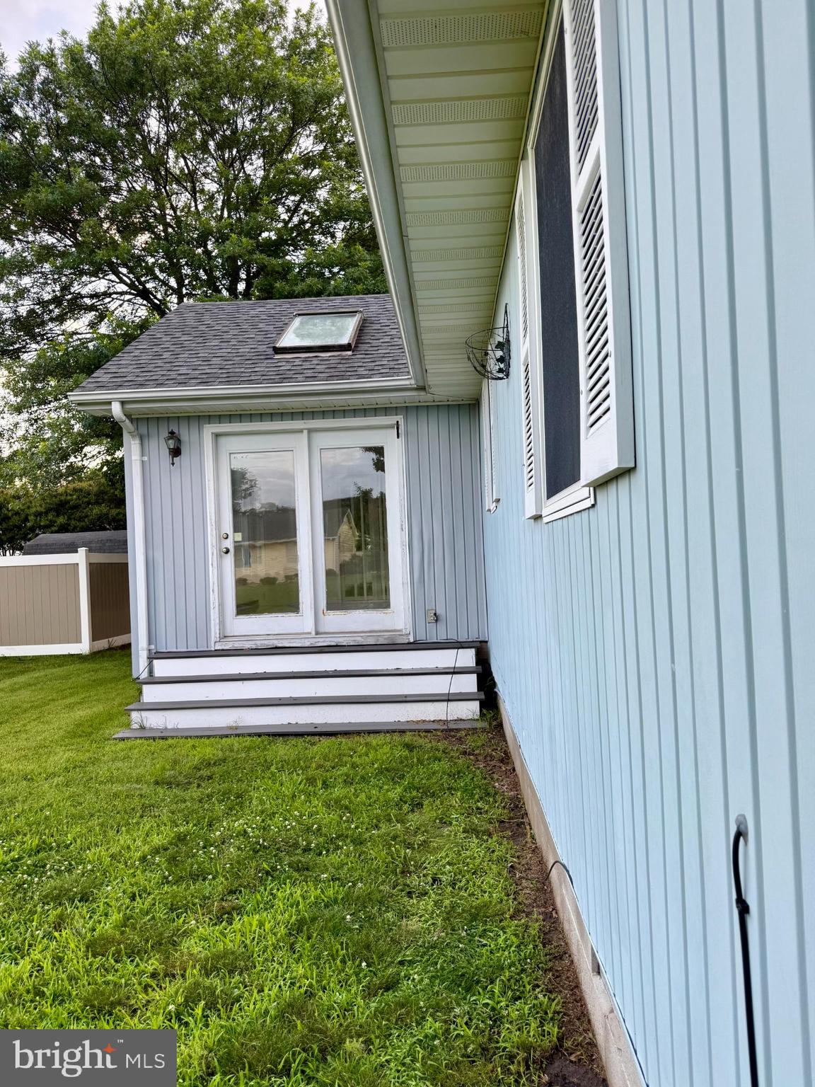 22 Windmill Lane Ocean View, DE 19970 - Photo 6 of 37 a front view of a house with a garden