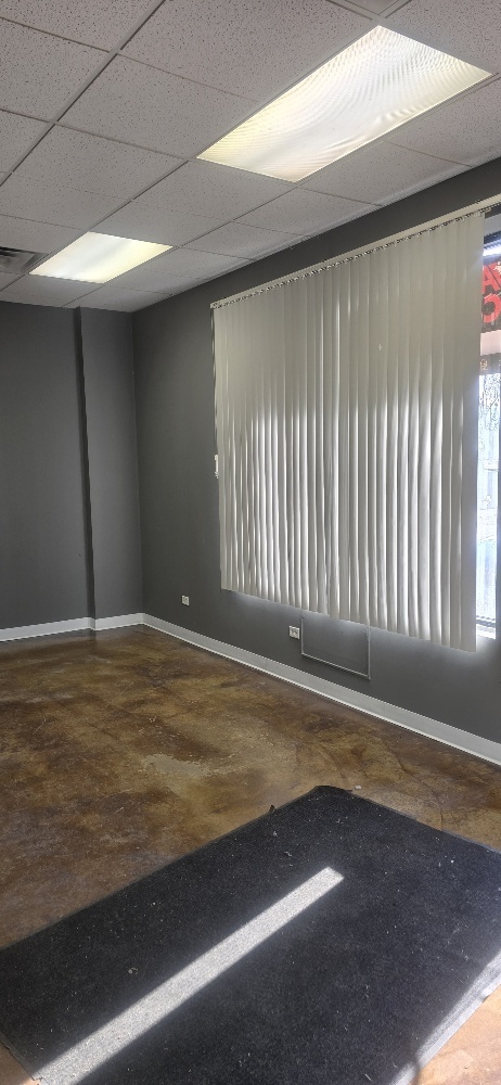 4410 Highway 176, Unit 9 Crystal Lake, IL 60012 - Photo 13 of 13 a view of an empty room with wooden floor