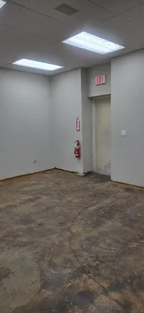a view of room with a hallway