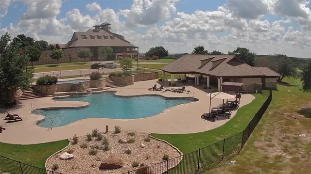 an aerial view of a house with outdoor space