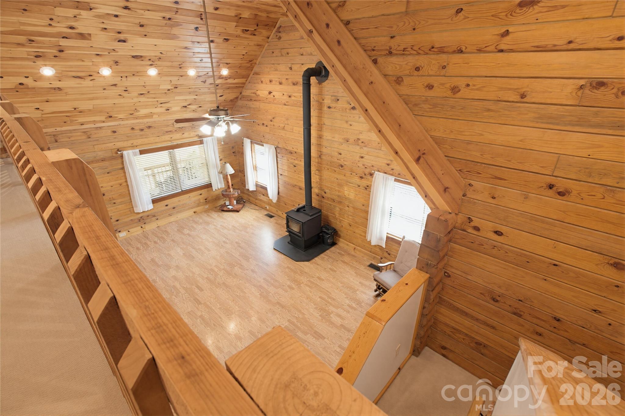 451 Rustic Ridge Drive Canton, NC 28716 - Photo 32 of 44 a view of a balcony with chair
