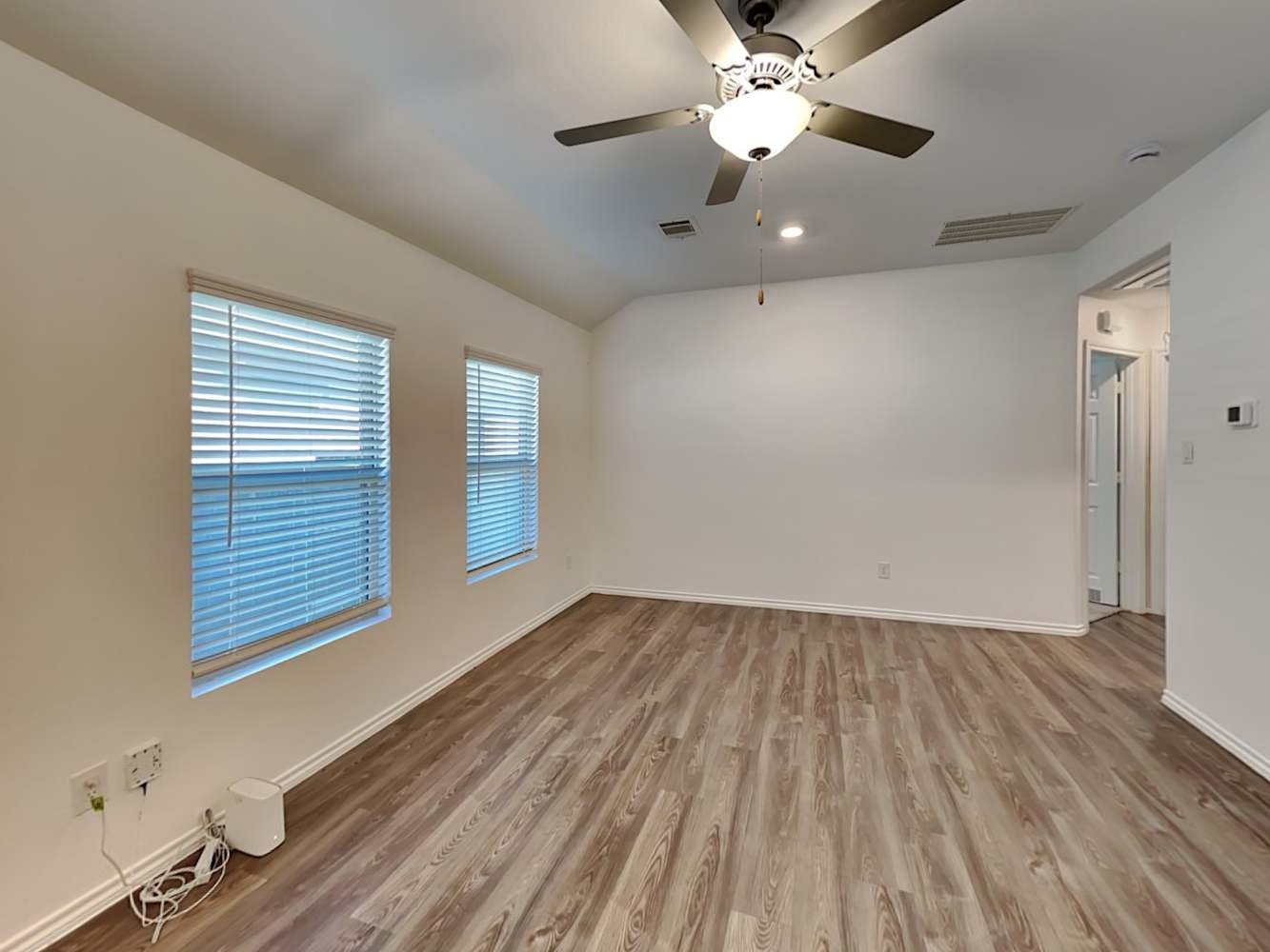 18823 Orvieto Court New Caney, TX 77357 - Photo 2 of 15 a view of an empty room with glass door and a window