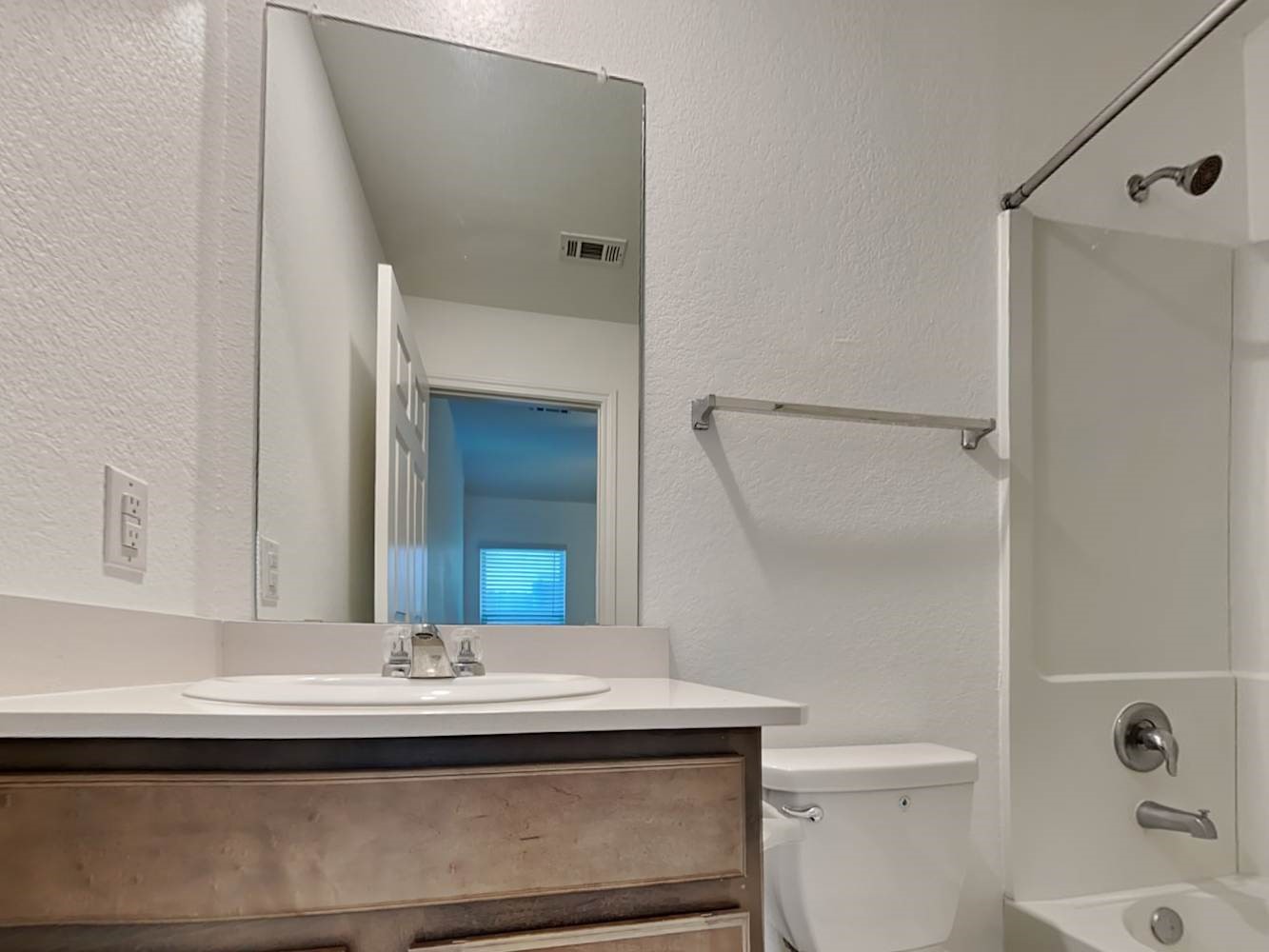 18823 Orvieto Court New Caney, TX 77357 - Photo 8 of 15 a bathroom with a sink and a mirror