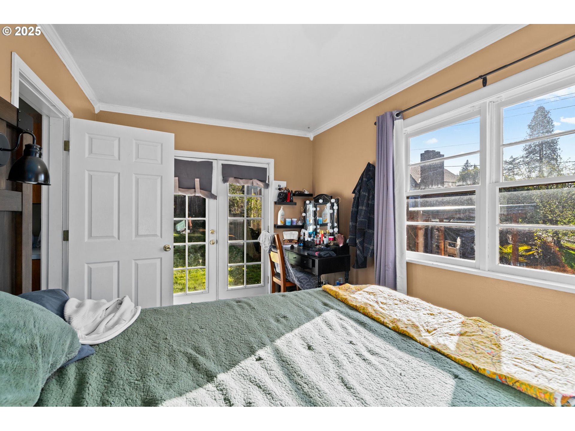 410 East D Street Rainier, OR 97048 - Photo 17 of 18 a bed room with a bed and a television