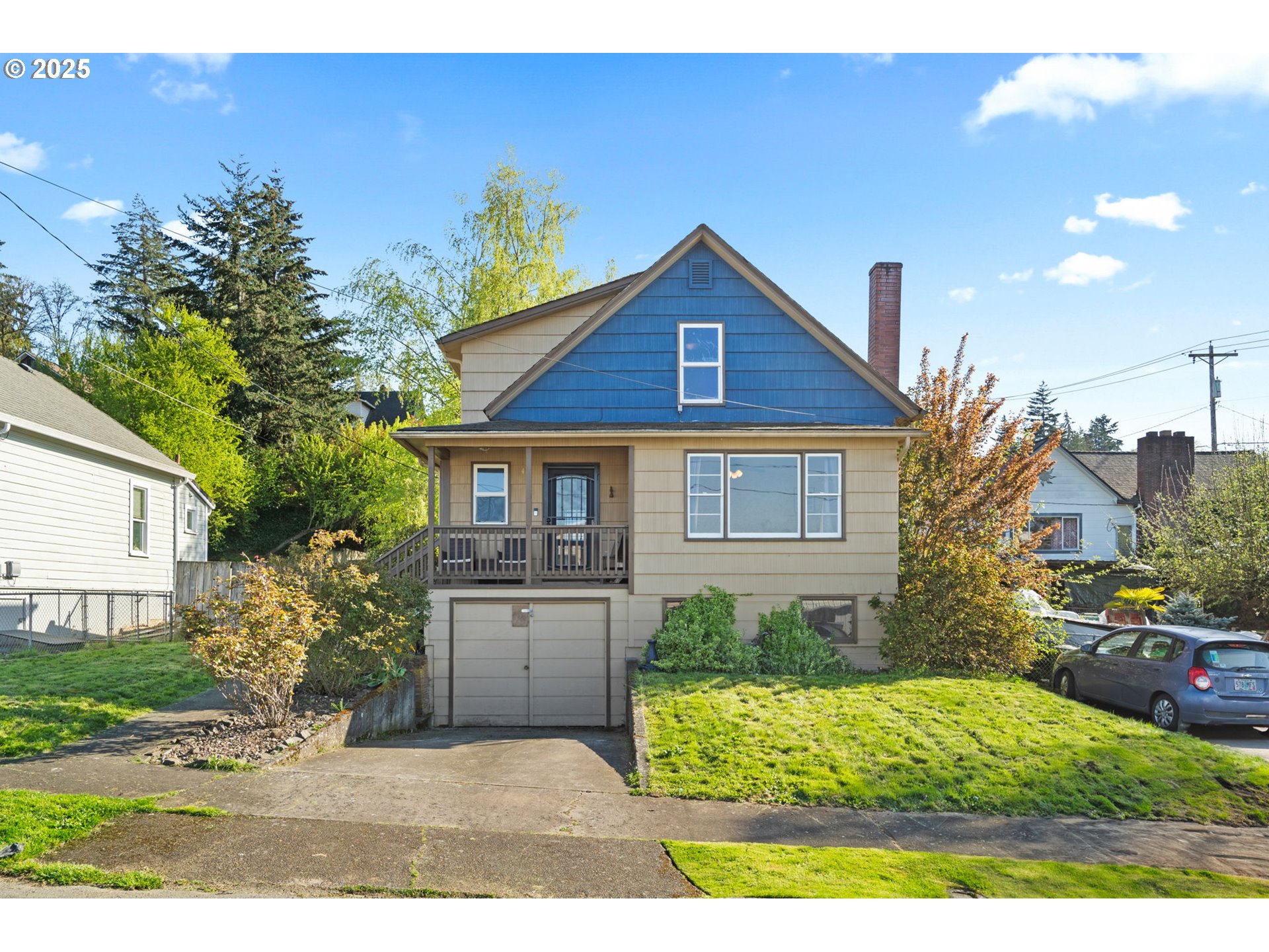 410 East D Street Rainier, OR 97048 - Photo 3 of 18 a front view of a house with a yard