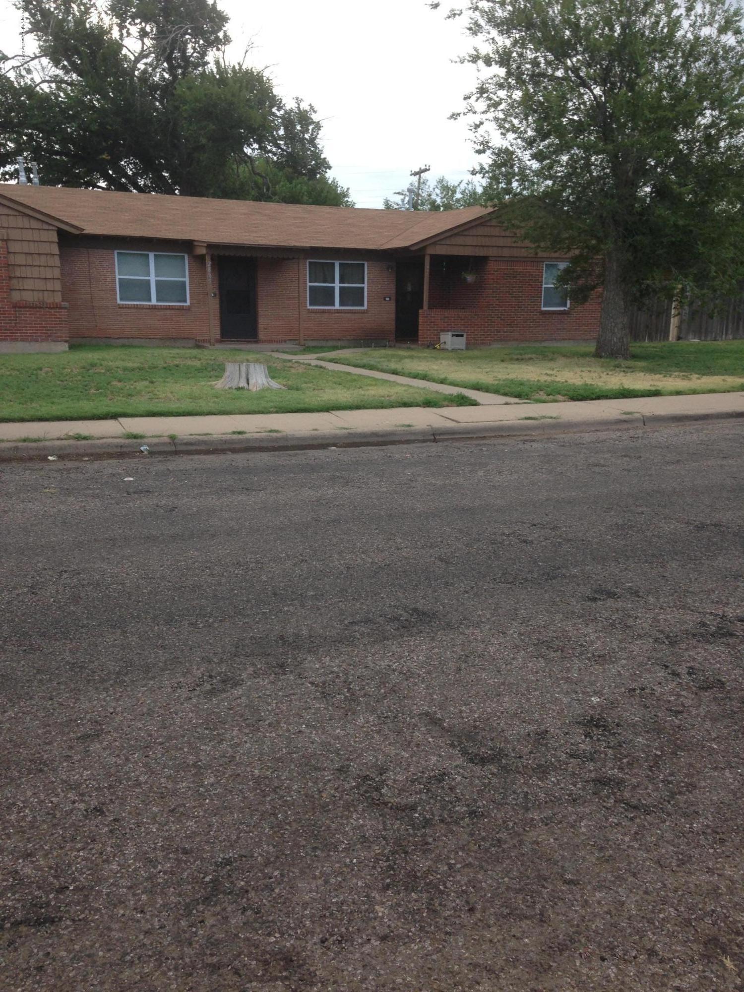 2805 Duncan Drive Amarillo, TX 79109 - Photo 1 of 1 a house that has a lot of windows and trees