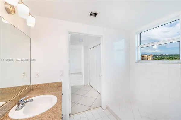 a view of a room with a window