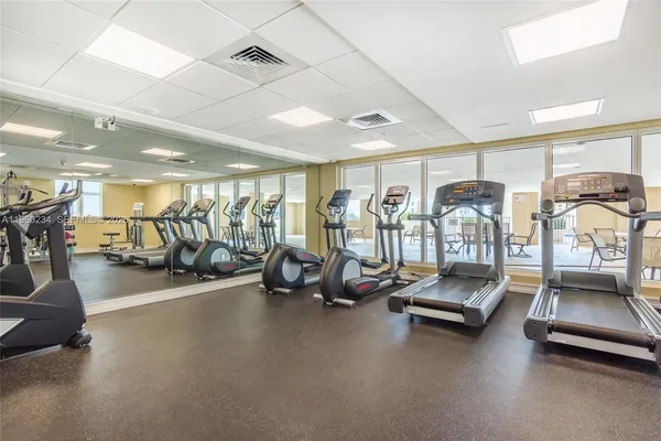 a view of a swimming pool with a lounge chairs