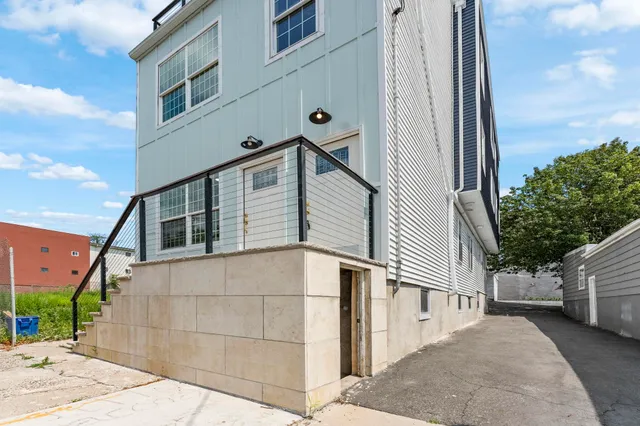 a view of a house with a street