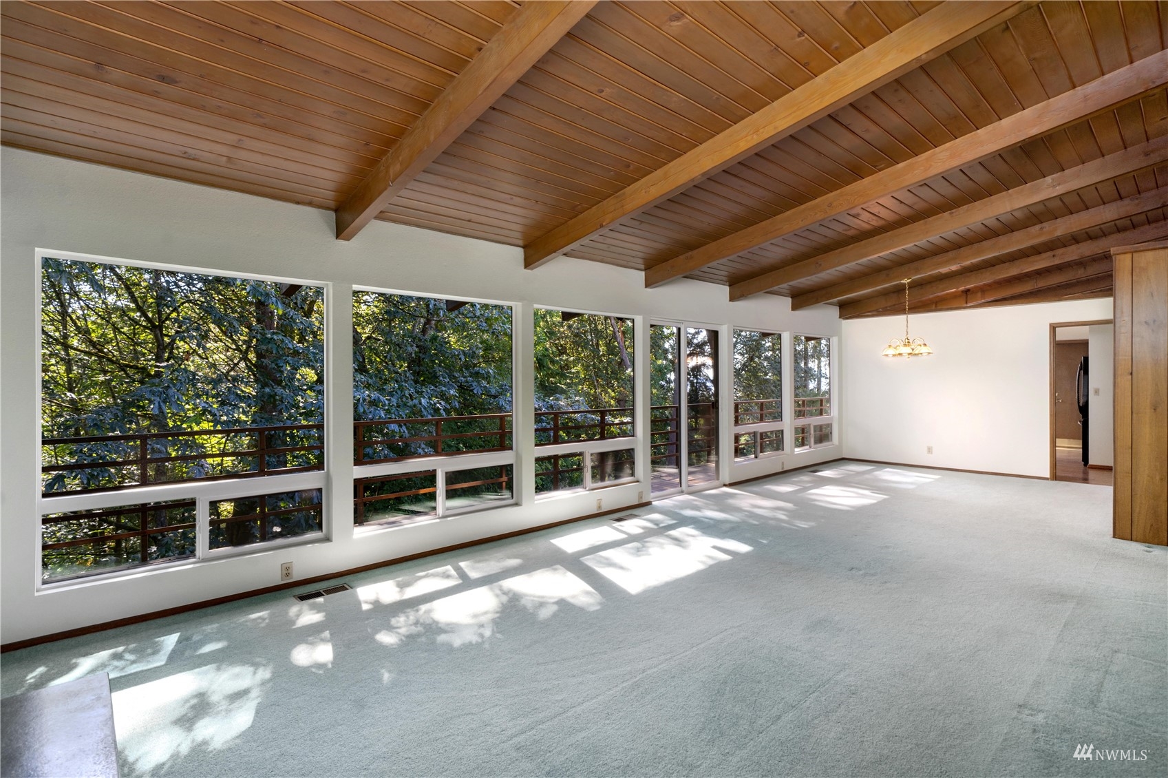30807 26th Avenue Southwest Federal Way, WA 98023 - Photo 15 of 40 a view of a porch with wooden floor and roof