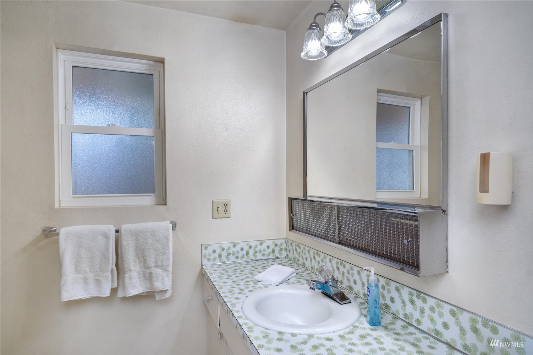 30807 26th Avenue Southwest Federal Way, WA 98023 - Photo 26 of 40 a bathroom with a sink and a mirror