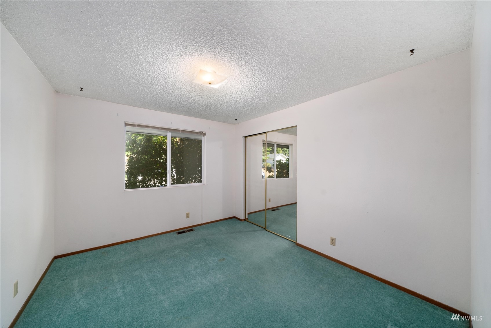 30807 26th Avenue Southwest Federal Way, WA 98023 - Photo 27 of 40 an empty room with windows