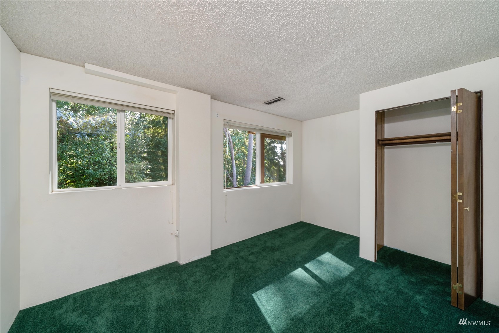 30807 26th Avenue Southwest Federal Way, WA 98023 - Photo 29 of 40 a view of an empty room with window and closet