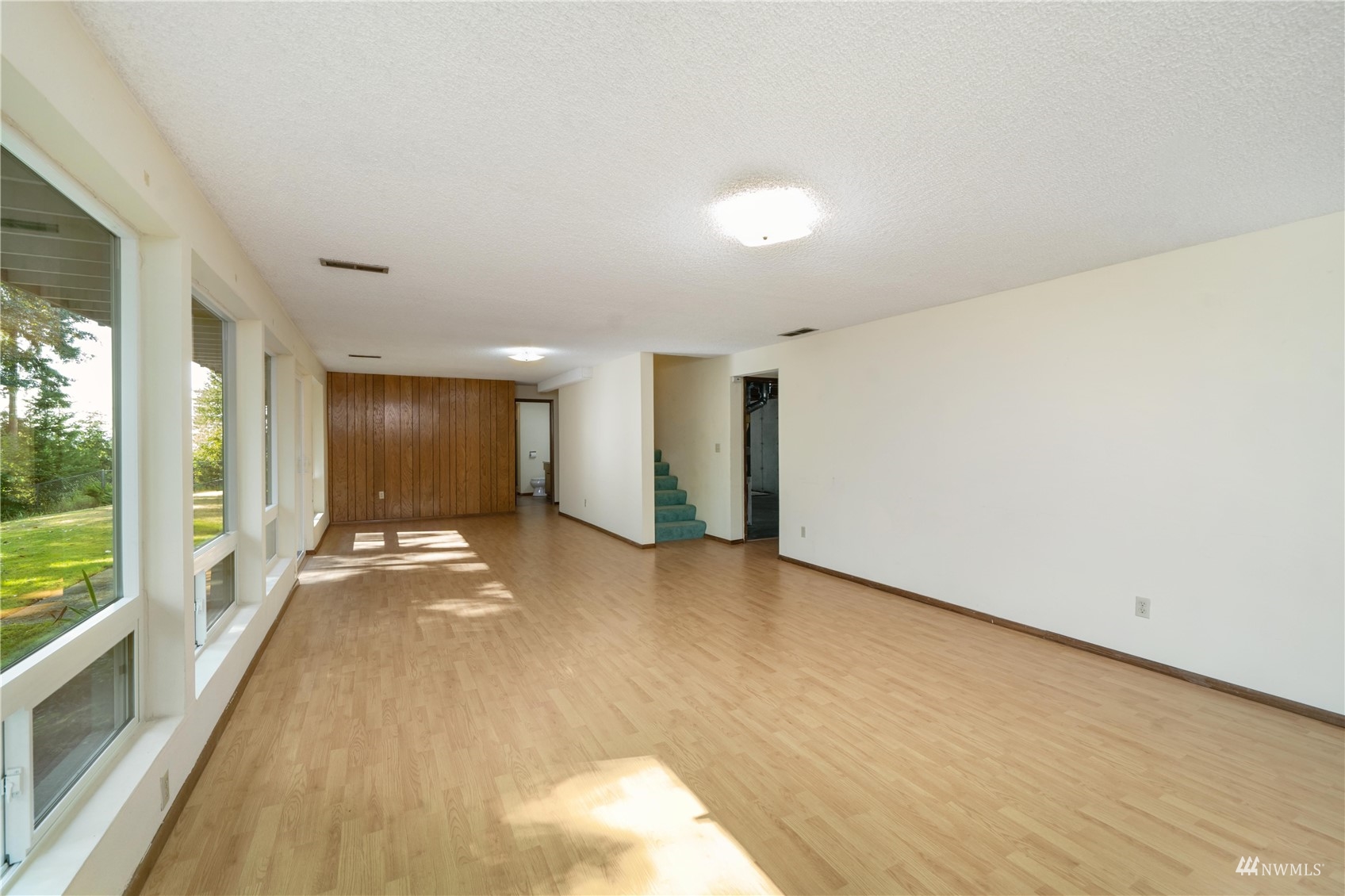 30807 26th Avenue Southwest Federal Way, WA 98023 - Photo 32 of 40 a view of a livingroom with a staircase