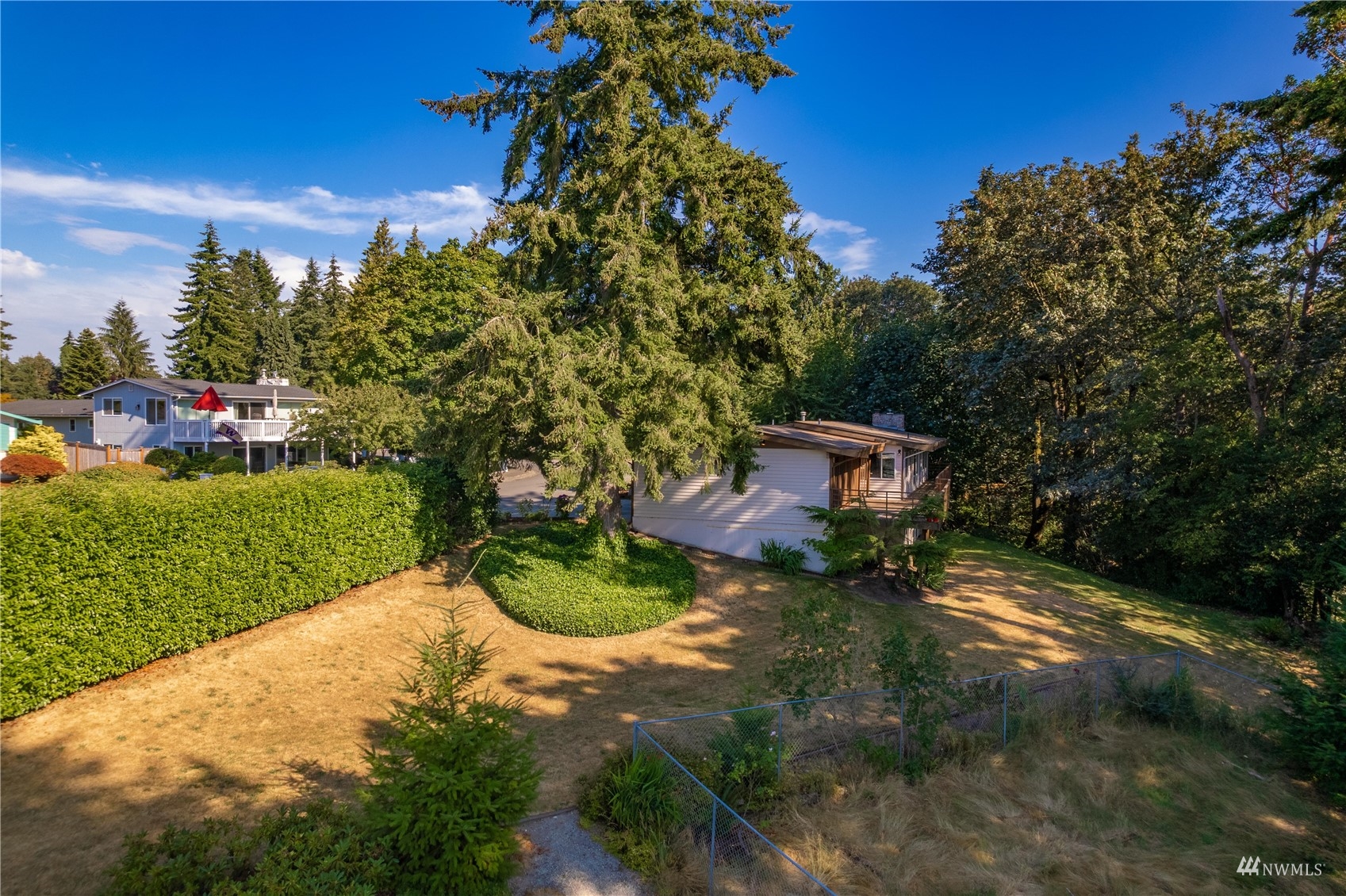 30807 26th Avenue Southwest Federal Way, WA 98023 - Photo 6 of 40 a backyard of a house with a yard and outdoor seating