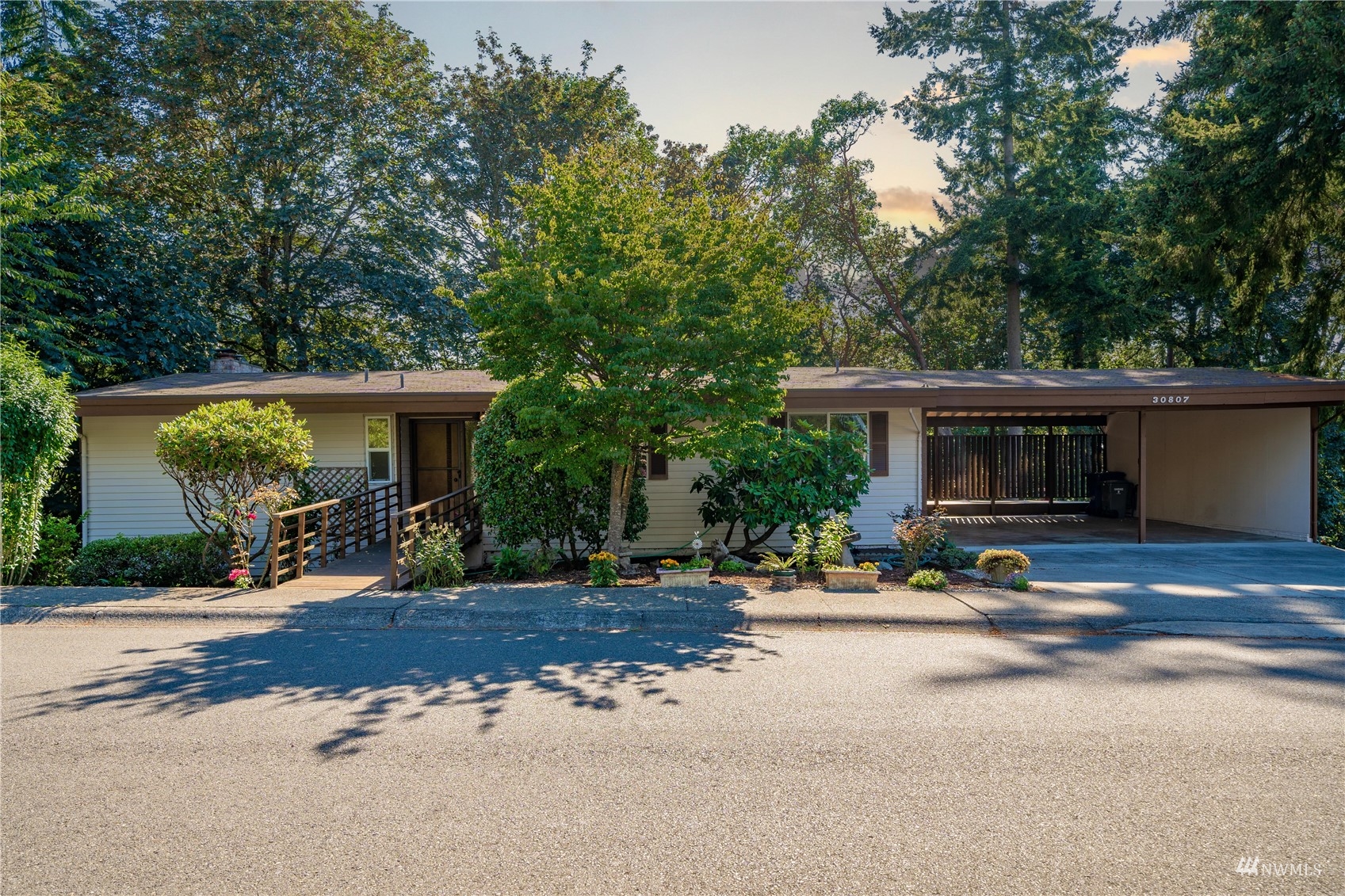 30807 26th Avenue Southwest Federal Way, WA 98023 - Photo 10 of 40 a view of a house with outdoor space and parking