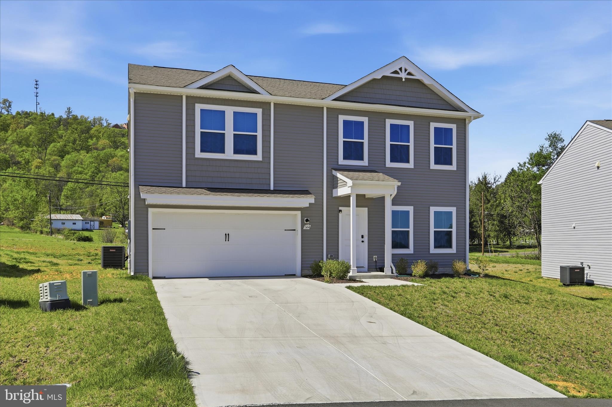 144 Scoter Road Hedgesville, WV 25427 - Photo 2 of 22 Attached 2-Car Garage & Oversized Driveway