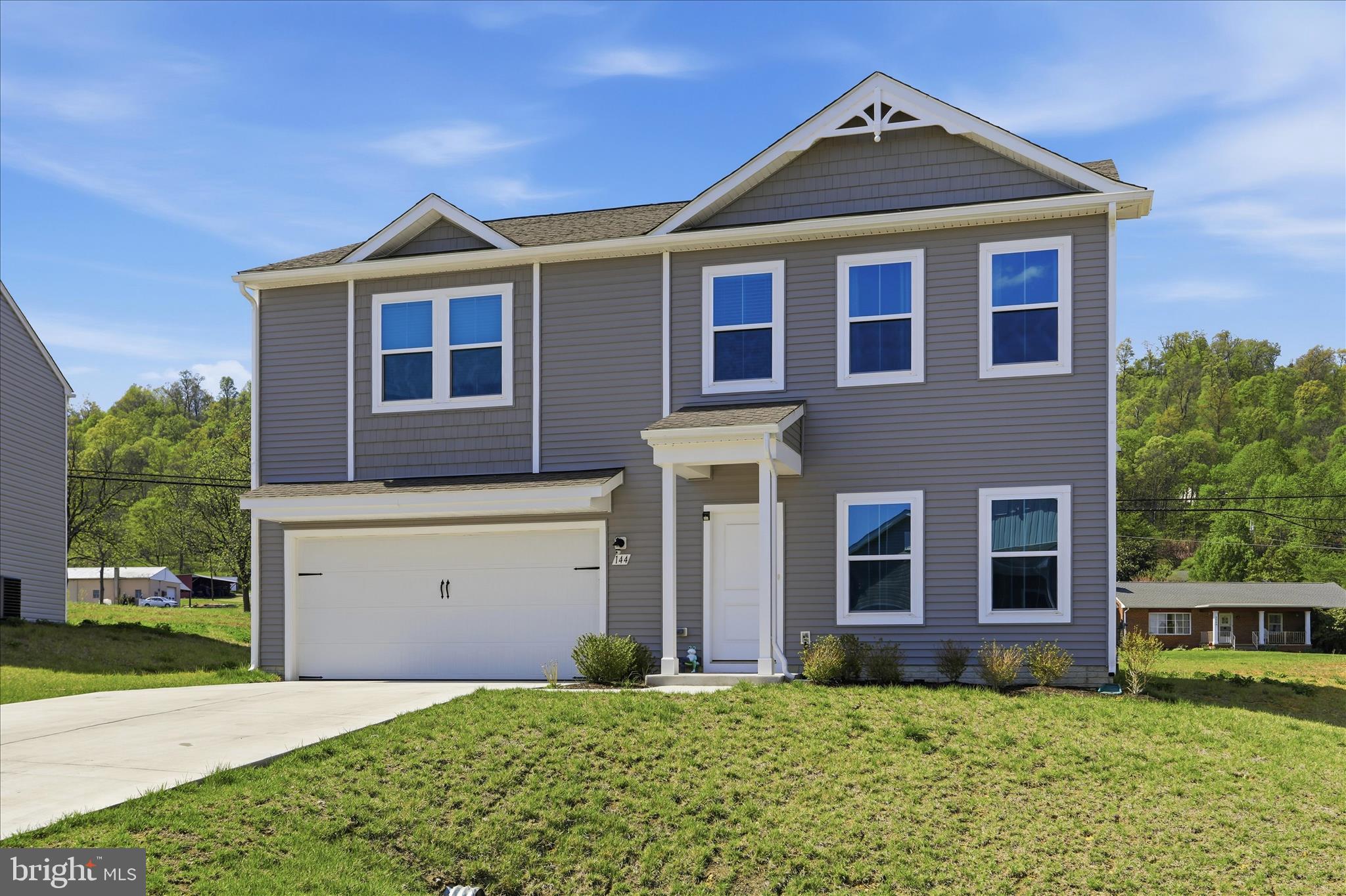 144 Scoter Road Hedgesville, WV 25427 - Photo 3 of 22 Modern Exterior with Shingle Accents