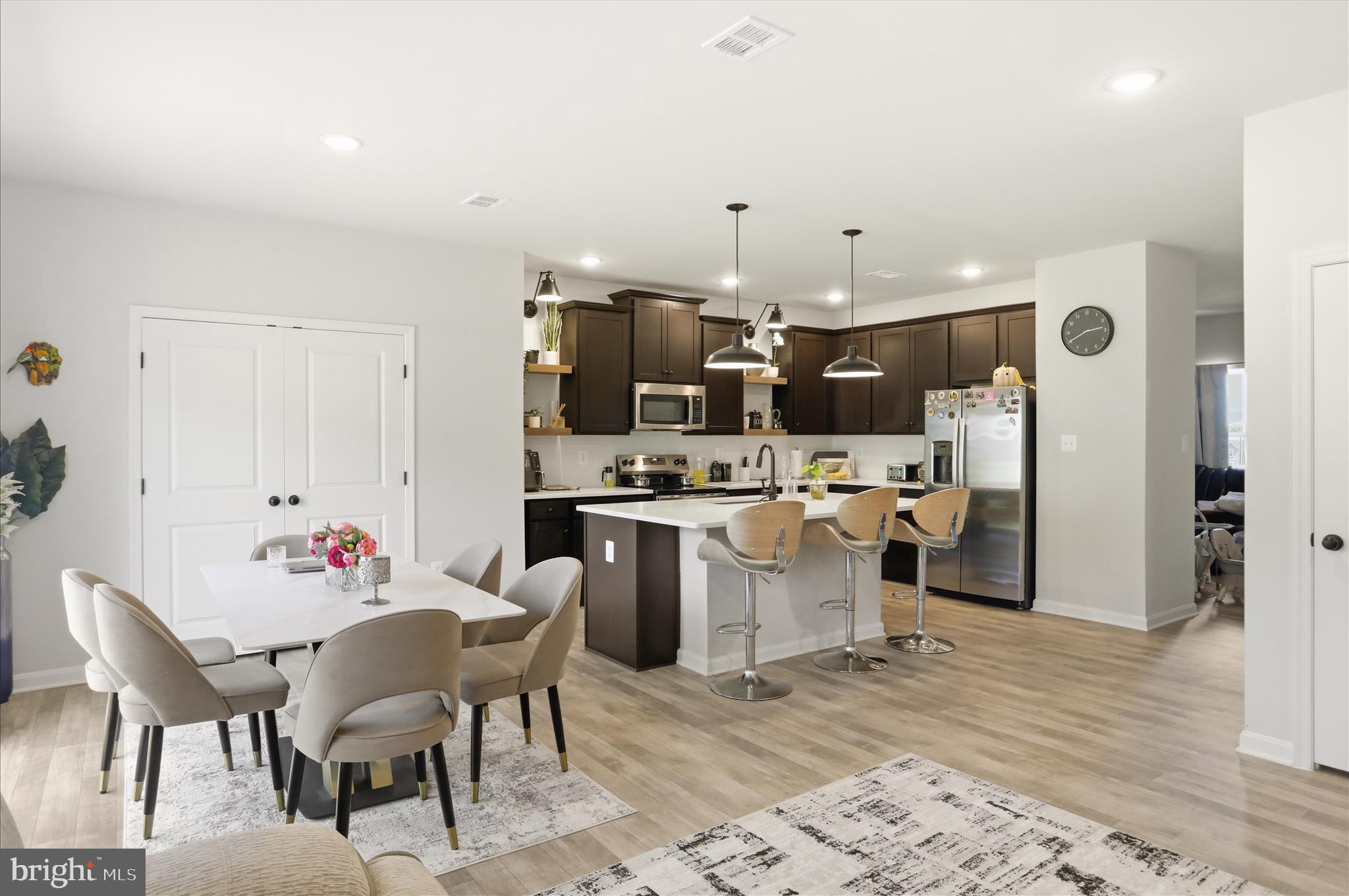 144 Scoter Road Hedgesville, WV 25427 - Photo 8 of 22 Open Concept Kitchen & Dining Area