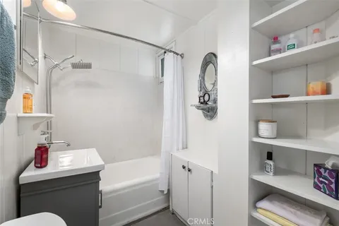 a bathroom with a bathtub sink and toilet