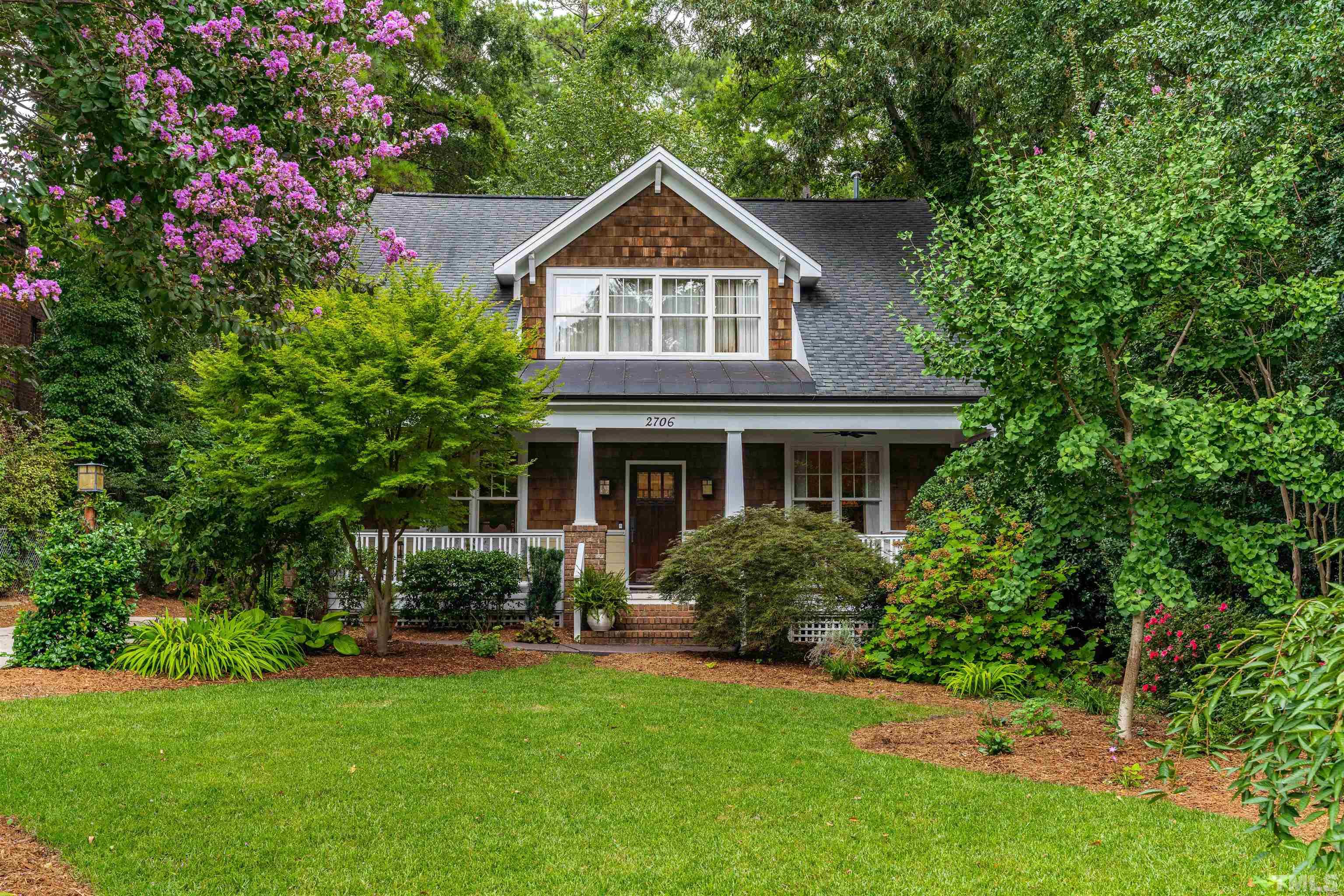 2706 Barmettler Street Raleigh, NC 27607 - Photo 1 of 43 a front view of house with yard and green space