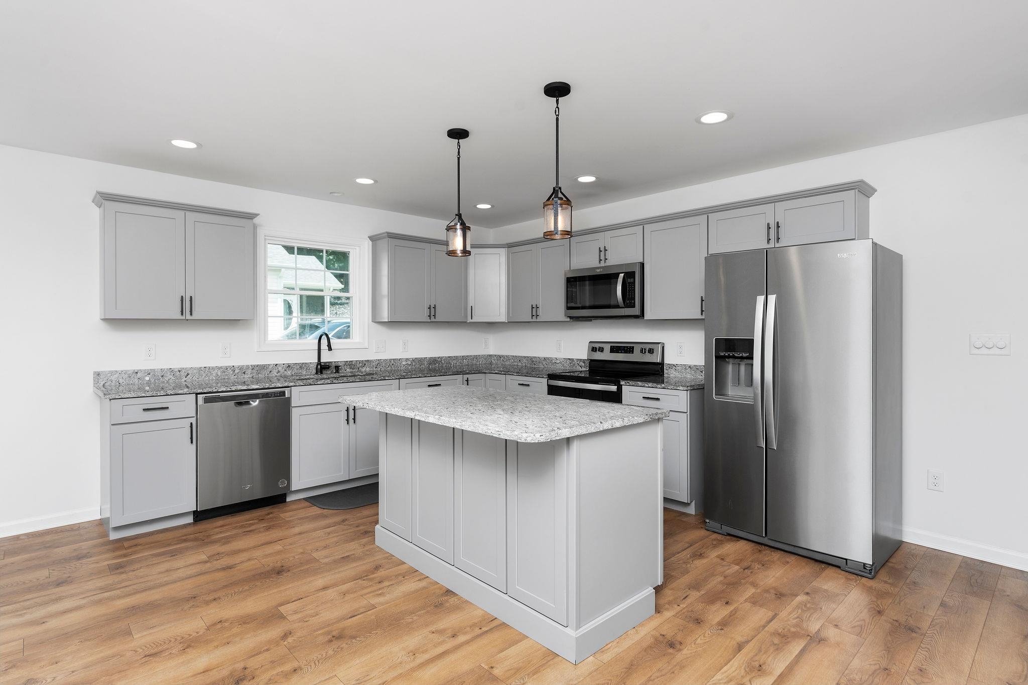 307 Kaolin Spring Lane Greenville, VA 24440 - Photo 4 of 7 a kitchen with a refrigerator a sink and a oven