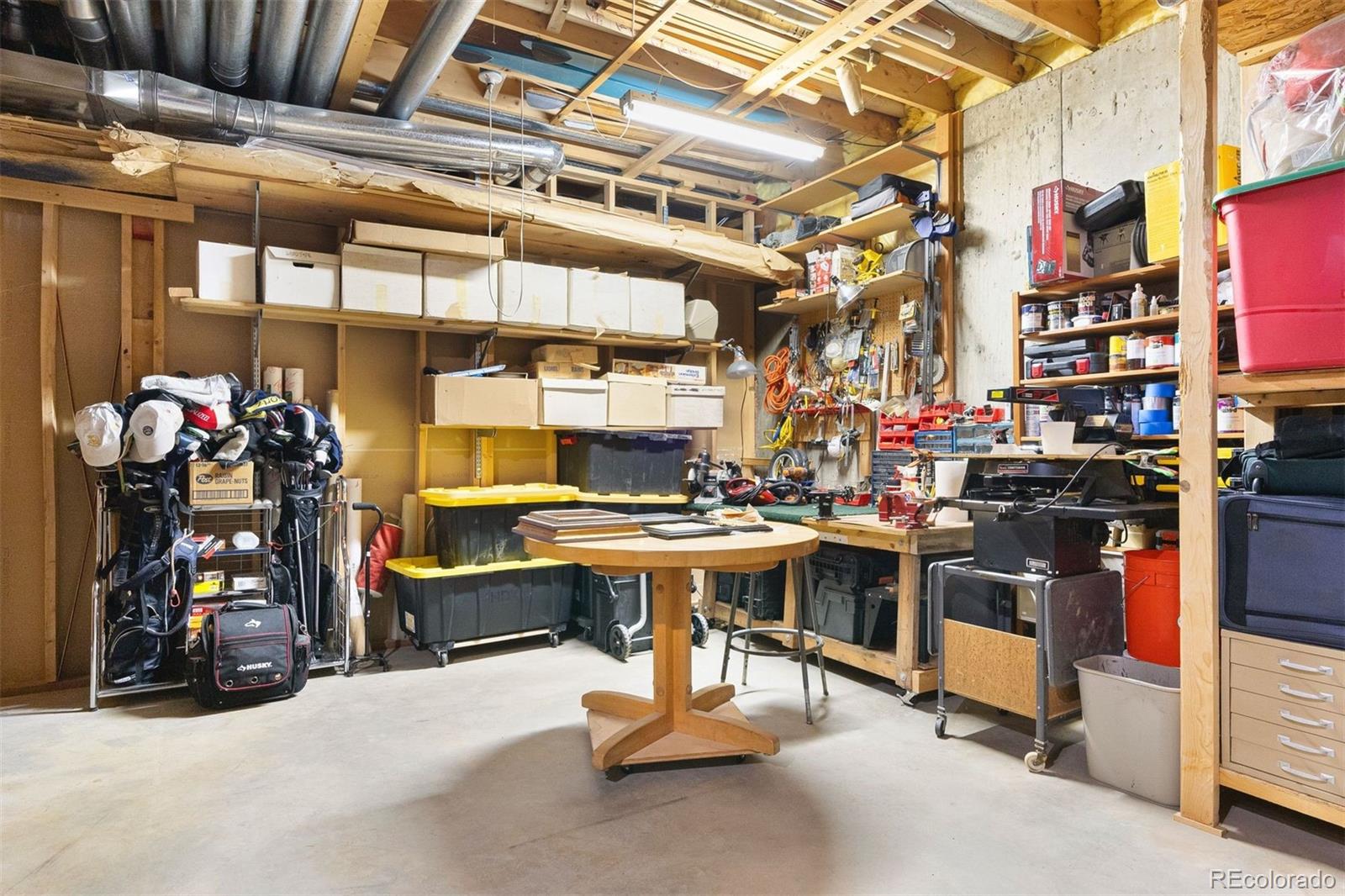 4275 Stonecliff Drive Evergreen, CO 80439 - Photo 48 of 48 a view of a storage room with a lot of stuff