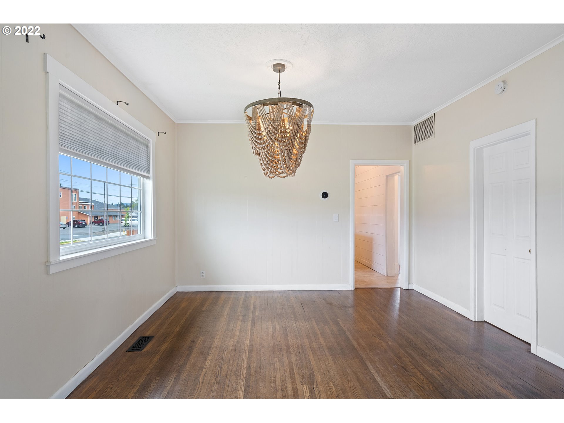 1802 8th Street Tillamook, OR 97141 - Photo 4 of 13 a view of wooden floor and windows in a room
