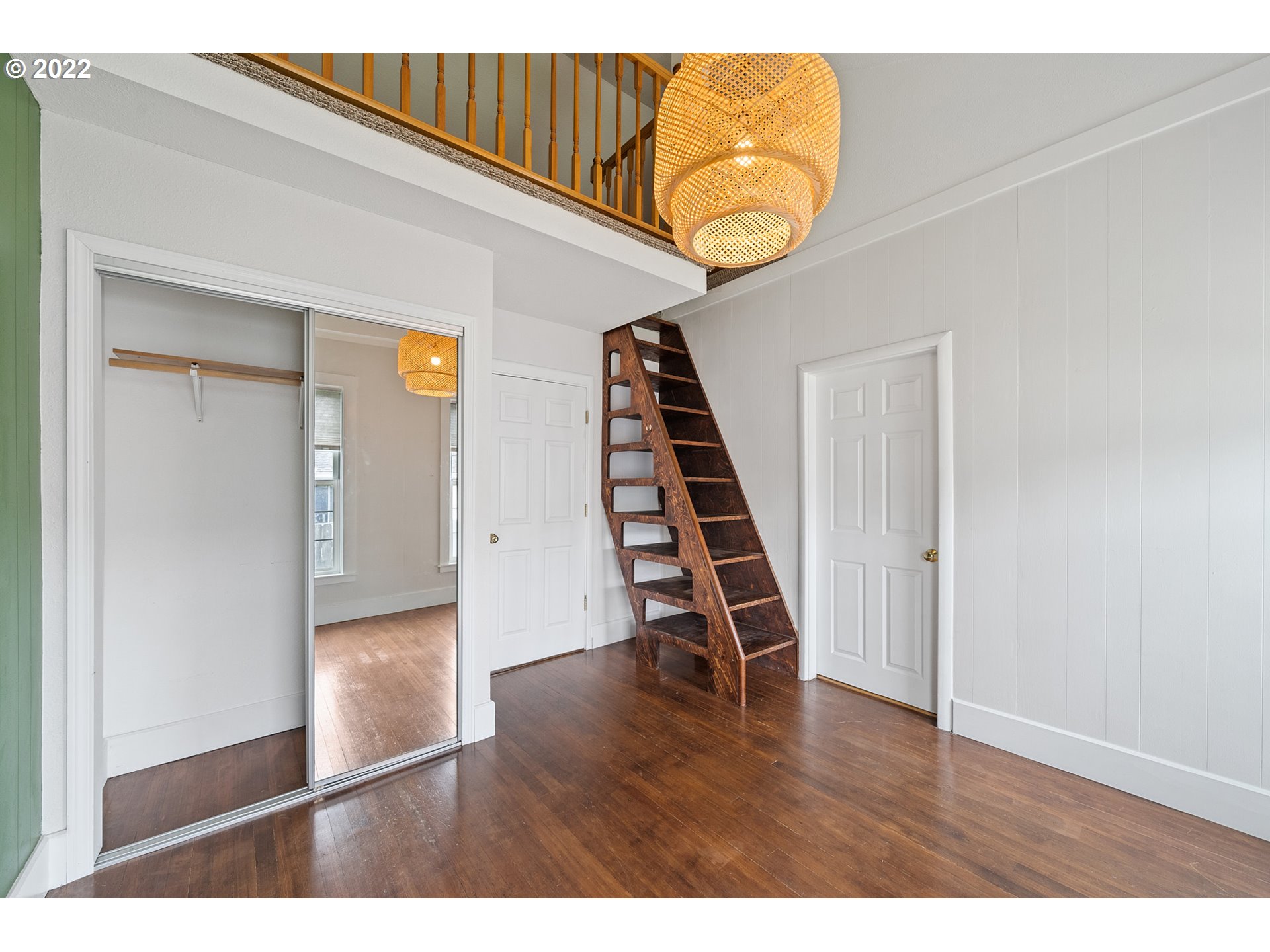 1802 8th Street Tillamook, OR 97141 - Photo 6 of 13 a view of wooden floor and windows in a room
