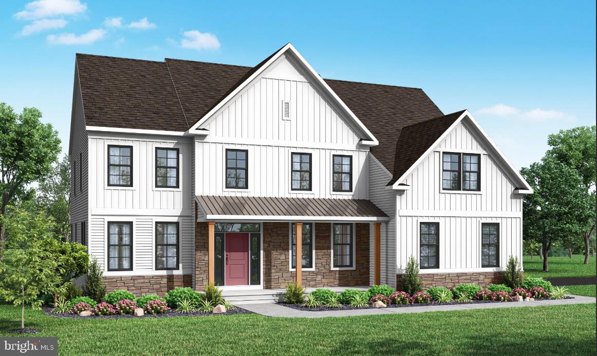 329 Green Top Road, Unit 5 Quakertown, PA 18951 - Photo 1 of 2 a front view of a house with garden