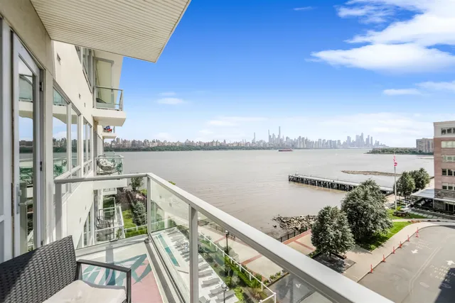 a view of a balcony with city view