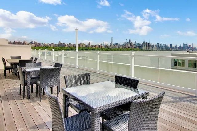 a terrace of a house with outdoor seating