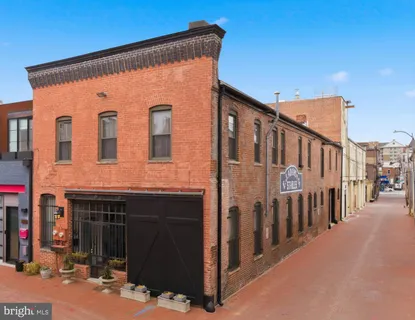 a front view of a building with glass windows