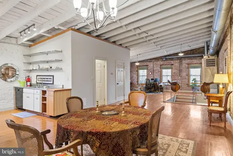 a view of livingroom with furniture and wooden floor