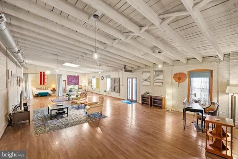 a kitchen with refrigerator and washer